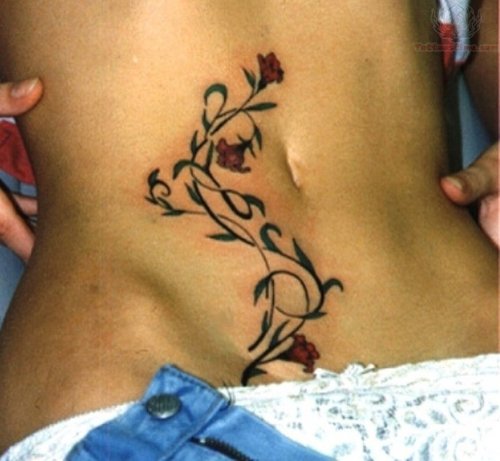Flower And Leaves Tattoo On Belly